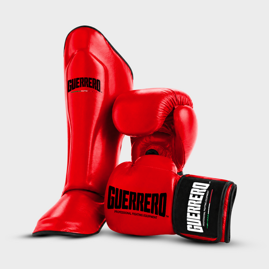 Sparring Kit Guantoni PRO Più Paratibie Impact Rossi in Vera Pelle | Guerrero™