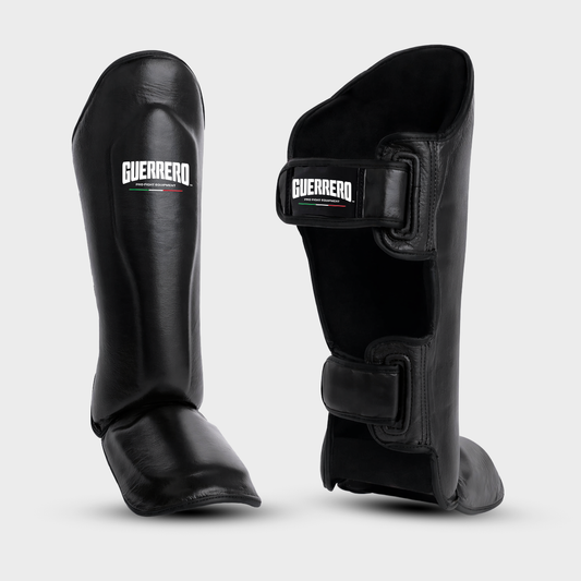 Espinilleras Impact Combat de cuero auténtico negro | Guerrero™
